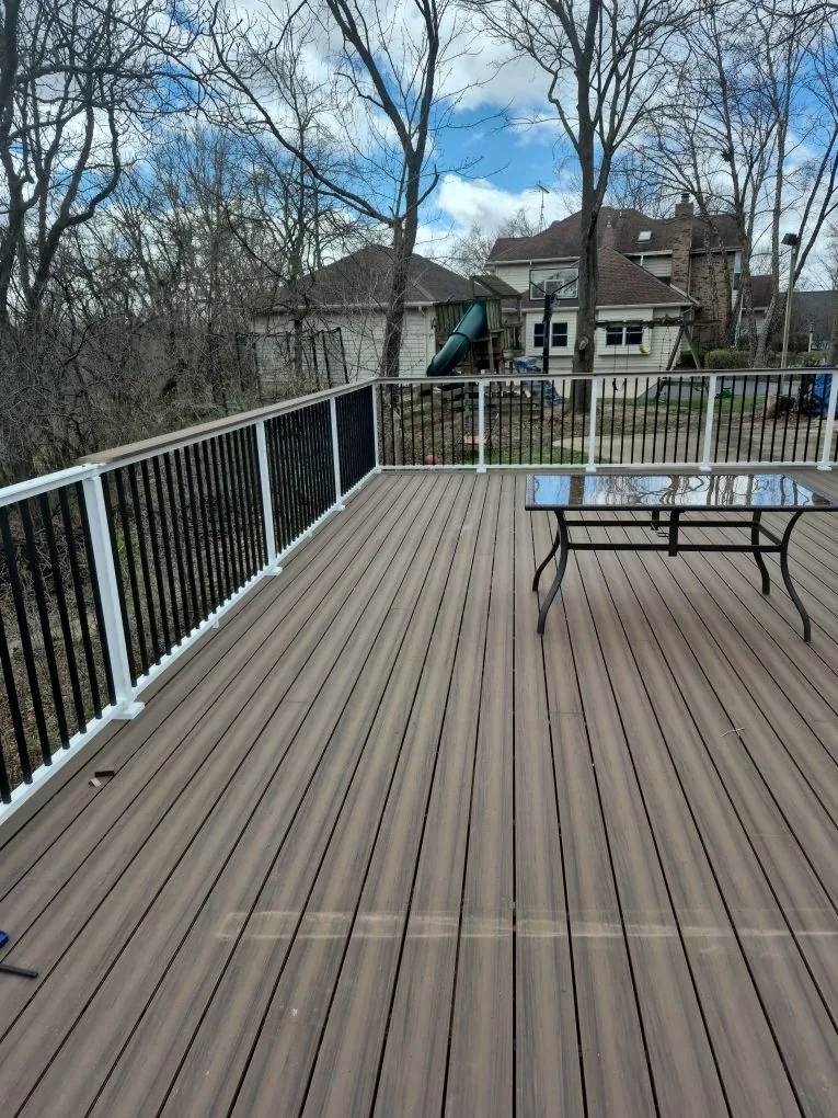 Deck railings overlooking the backyard