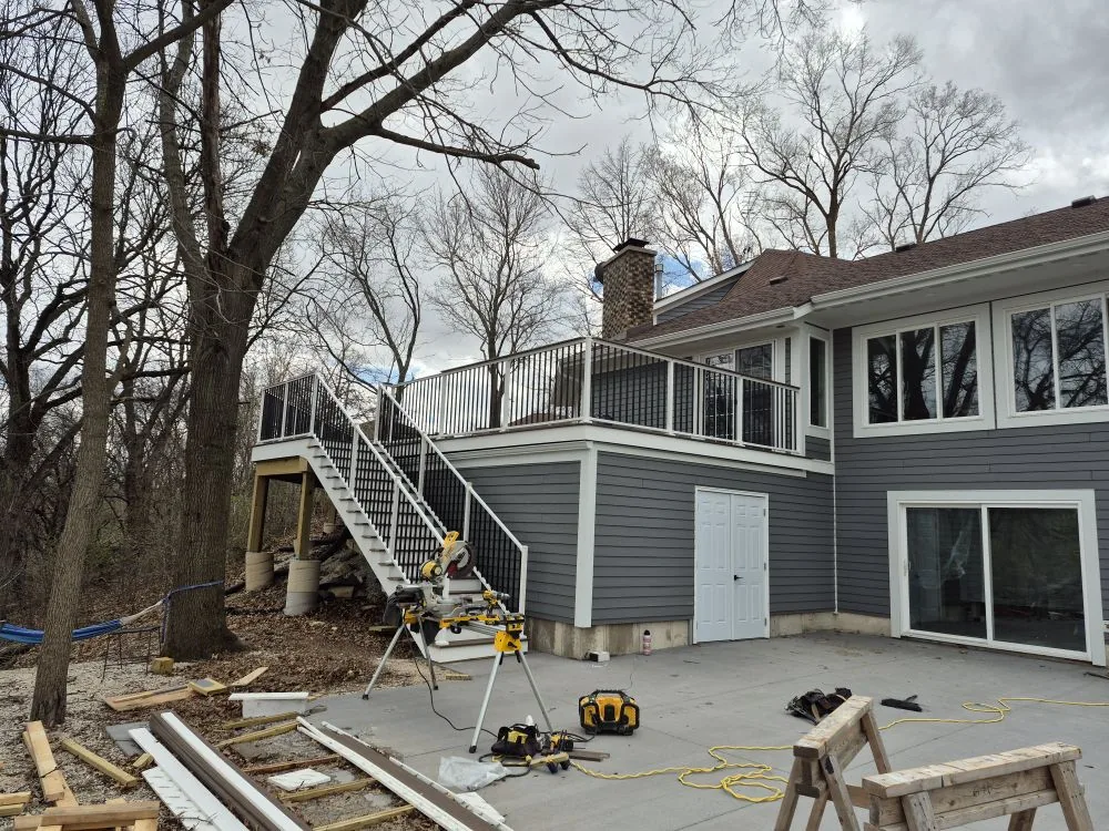 Finished second-story deck with stairs down to the patio